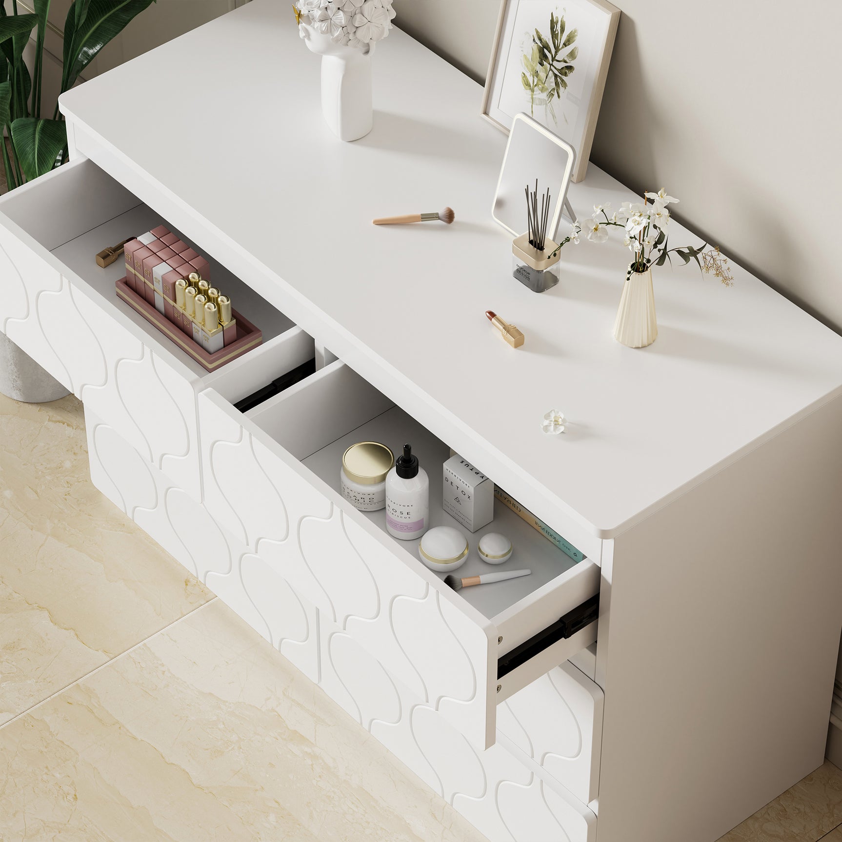Commode blanche avec 6 tiroirs au design ondulé, finition laquée élégante et coins renforcés