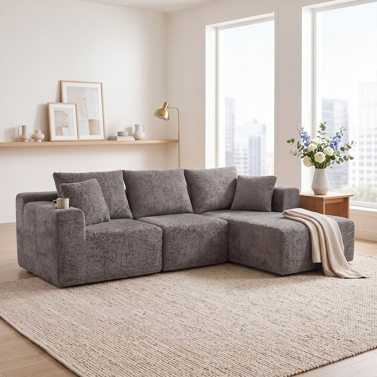 2-seater sofa bed in dark gray fabric with side pockets, modern convertible sofa