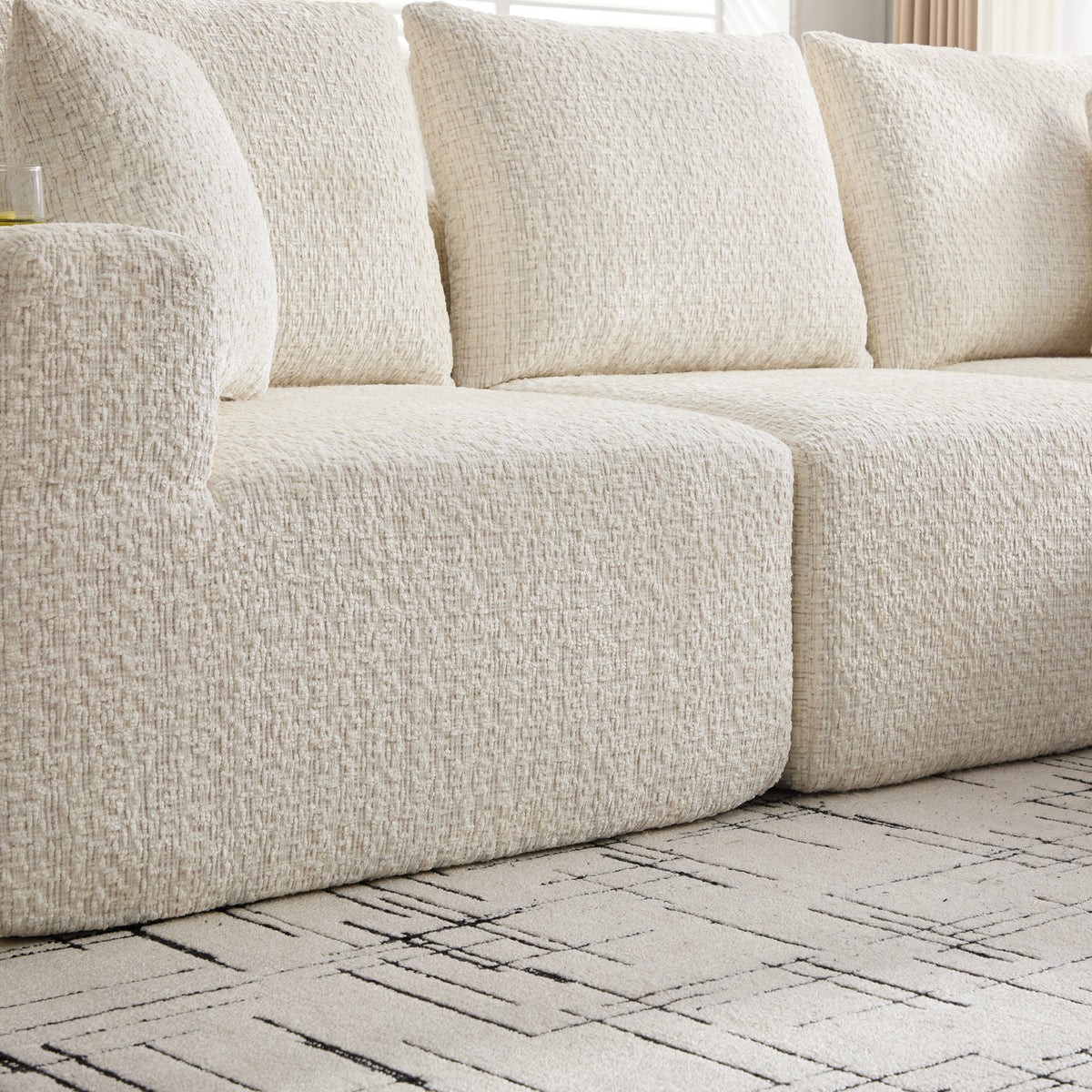 2-seater sofa bed in dark gray fabric with side pockets, modern convertible sofa