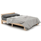 Lit double 140x200 cm en bois massif de pin naturel avec sommier à lattes et tête de lit, structure robuste et design intemporel, sans matelas.