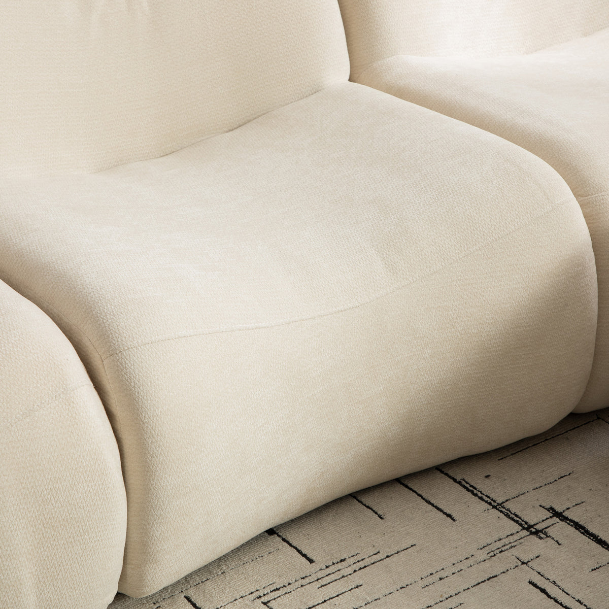 2-seater sofa bed in dark gray fabric with side pockets, modern convertible sofa