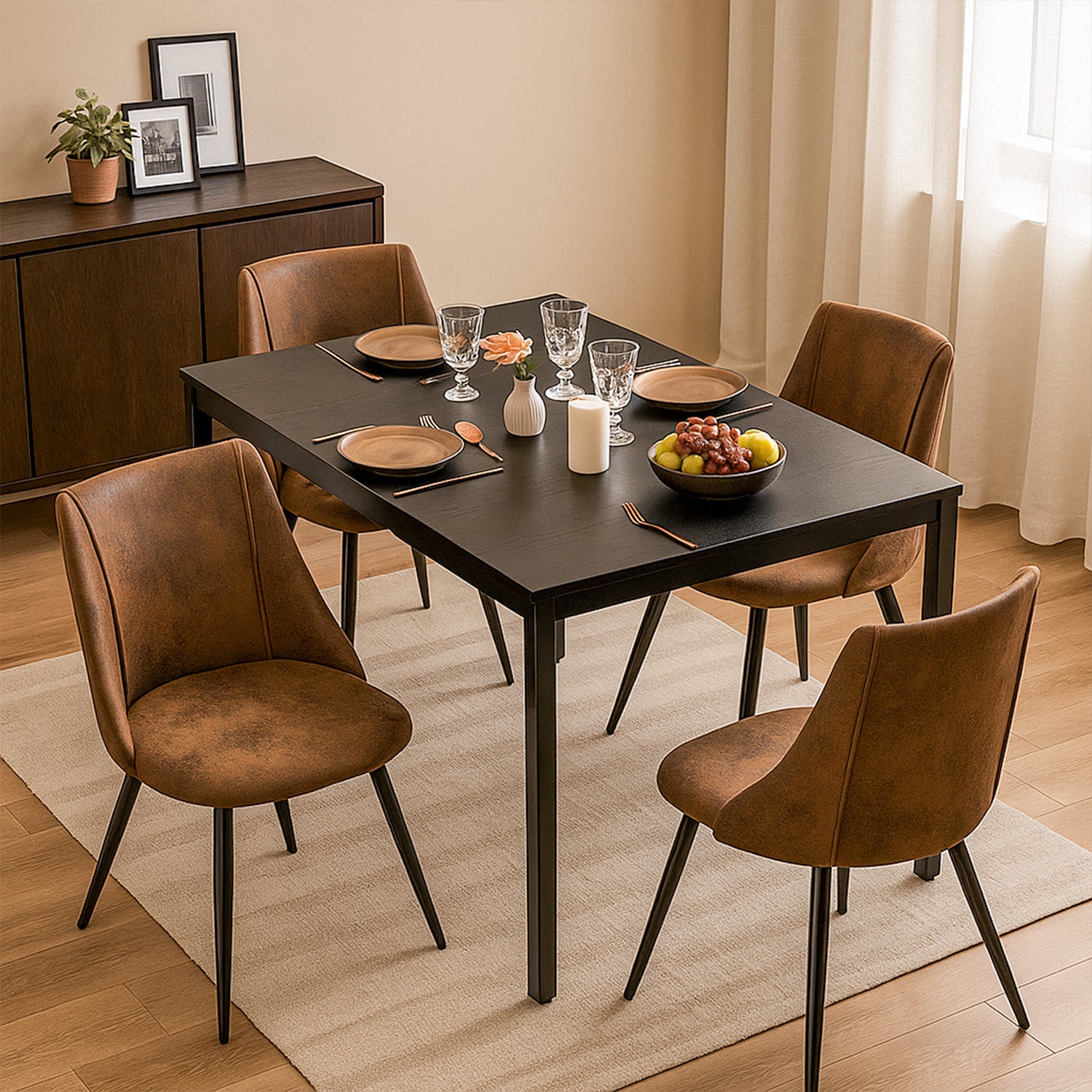 Ensemble table à manger extensible noire avec 4 fauteuils en suédine, style scandinave