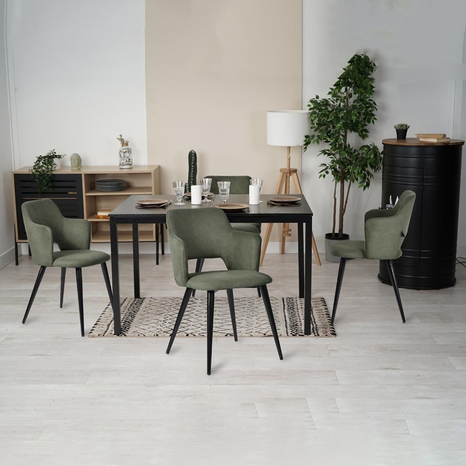 Ensemble table à manger extensible noire et 4 fauteuils en tissu vert de style scandinave
