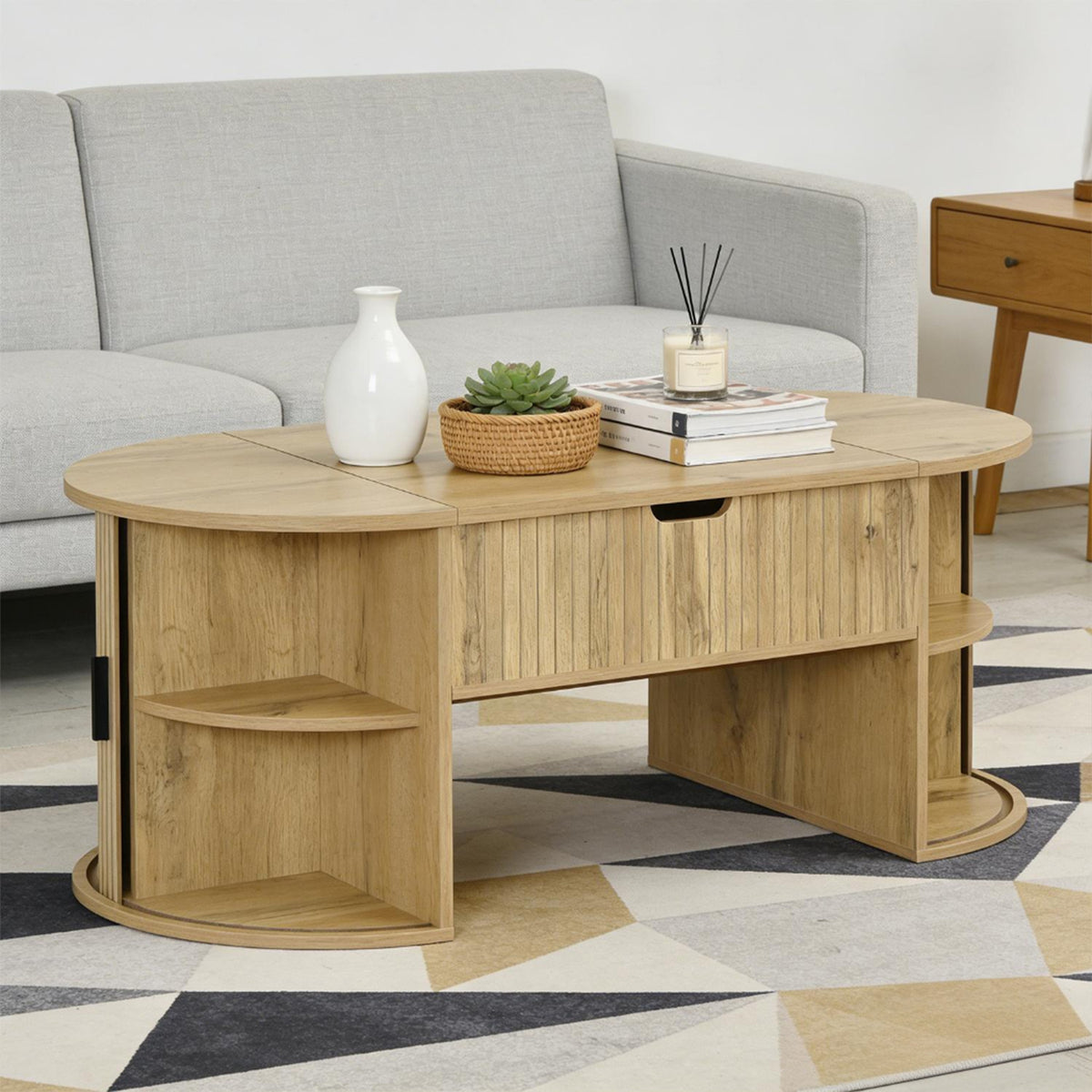 Table basse en MDF de forme ovale, couleur chêne clair, hauteur réglable