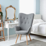 Scandinavian armchair with armrests in padded gray fabric - kas